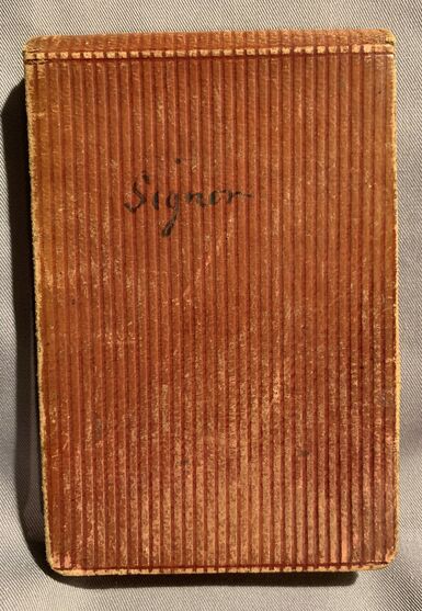 Sketchbook cover with writing reading "Signor"