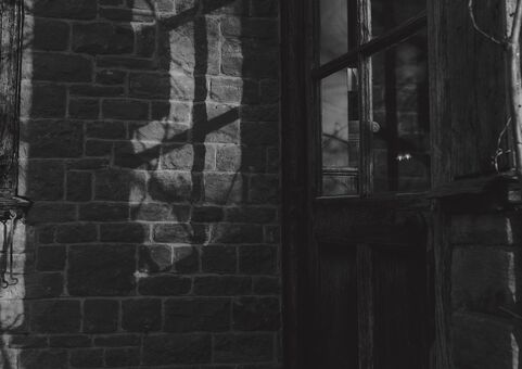 Dark shadowed image of a window