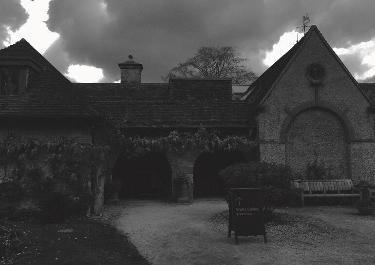 Dark black and white image of outside of gallery