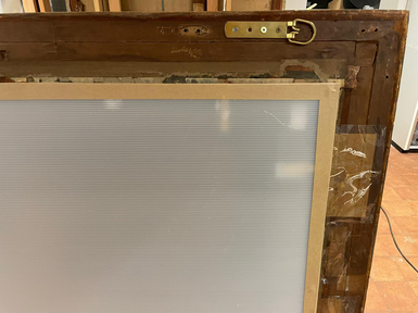 Backboard attached to back of canvas