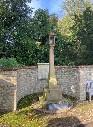 A stone war memorial sits in an alcove