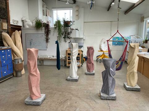 Four sculptural columns in Halima's studio