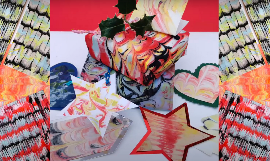 A collage of vibrant and colourful abstract art pieces, including patterns resembling butterfly wings and star shapes, arranged in a symmetrical layout.