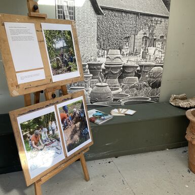 Photo of a display of the Compton Pottery moulds in the Artist in Residence studio at Watts Gallery