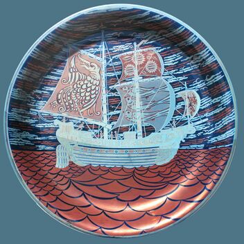 Lustreware dish of a blue ship on a red coloured sea, with red sails that have designs on them. The sky is a mixture of light blue, dark blue with bits of red throughout