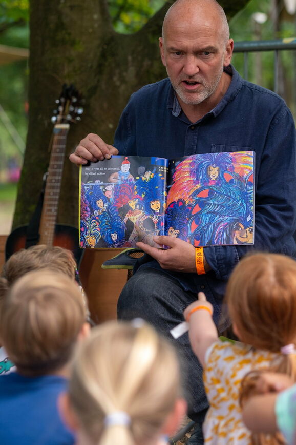 Ed reading his book 'Carried Away with the Carnival!'