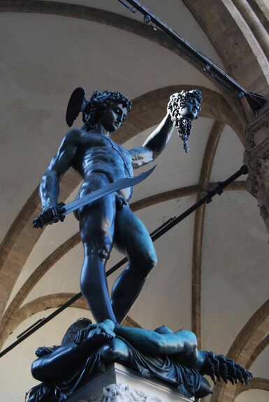 Sculpture depicting Perseus with the head of Medusa on a plinth