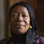 Magdalene smiles to camera