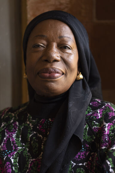 Magdalene smiles to camera