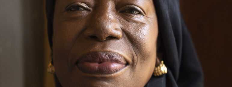 Magdalene smiles to camera