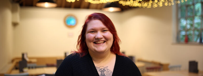 Roxy smiles to the camera in the Tea Shop