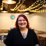 Roxy smiles to the camera in the Tea Shop