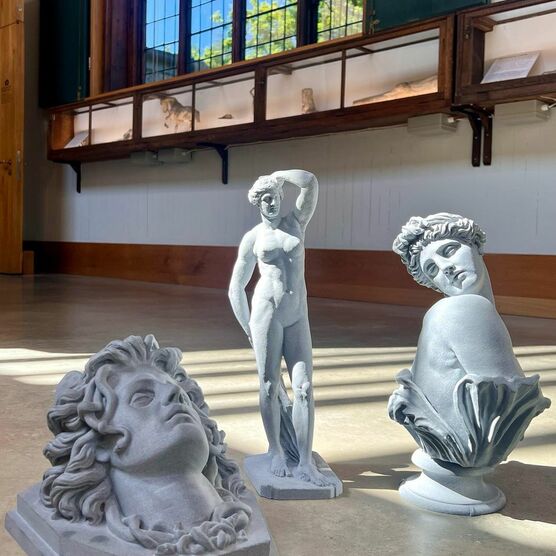 Three 3d grey models of sculptures