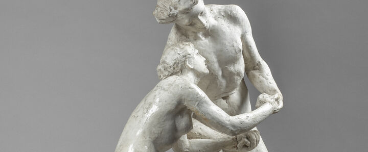 Photo of small sculpture of a nude man and woman