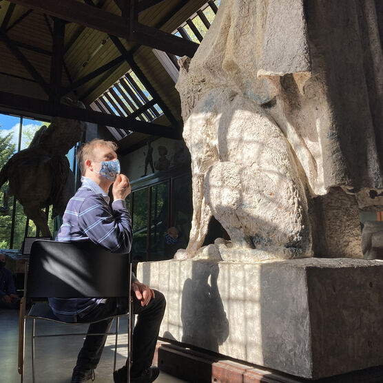 Chris Pavia in the sculpture gallery during the filming of Beyond the Waves