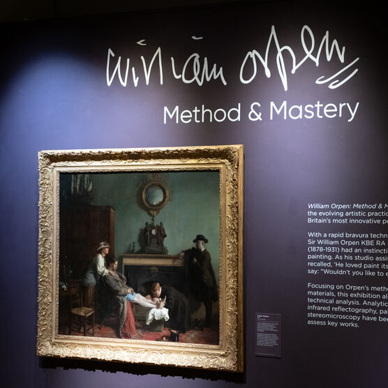 Photo of past exhibition 'William Orpen: Method and Mastery' with painting set against dark blue wall