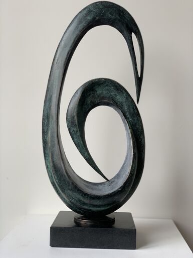 Bronze sculpture by Lucy Lutyens  of an oval shaped spiral