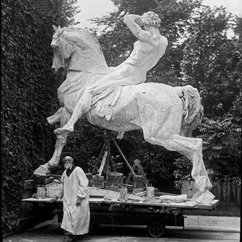 G F Watts stands underneath Physical Energy, dwarfed by its size.