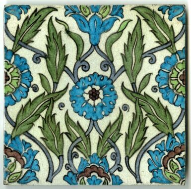 8 inch tile with turquoise, manganese and green Iznik inspired floral pattern.