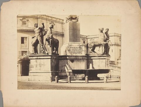 Statues of horse tamers surrounding a fountain