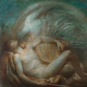 A man reclines with a woman leaning over him