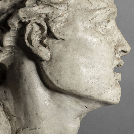 Side profile of a head, made in plaster