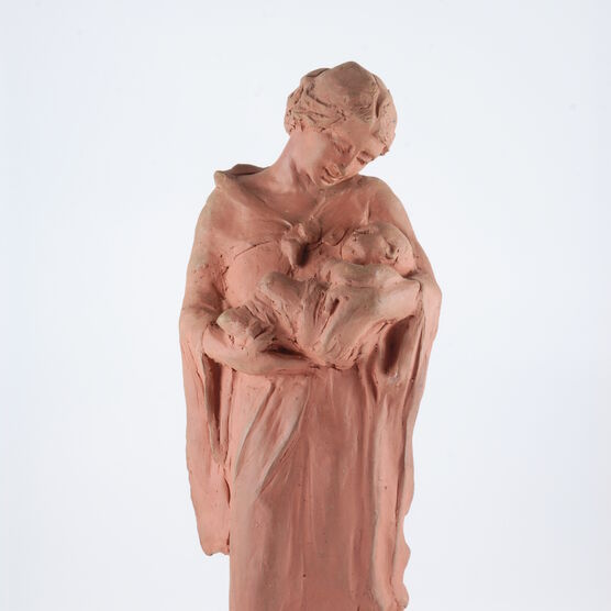 A terracotta figurine of Mary and Child