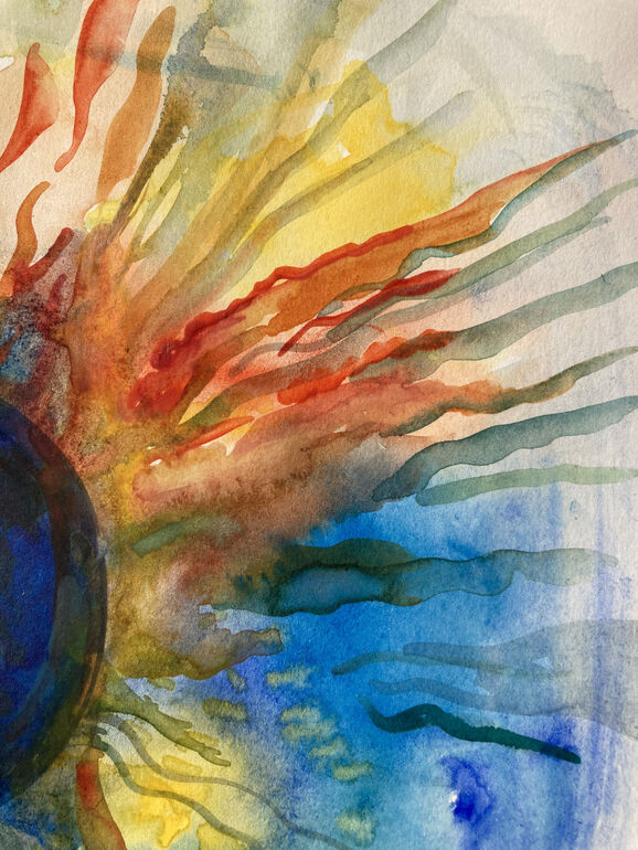 Watercolour painting of the sun in shades of blue, yellow and red