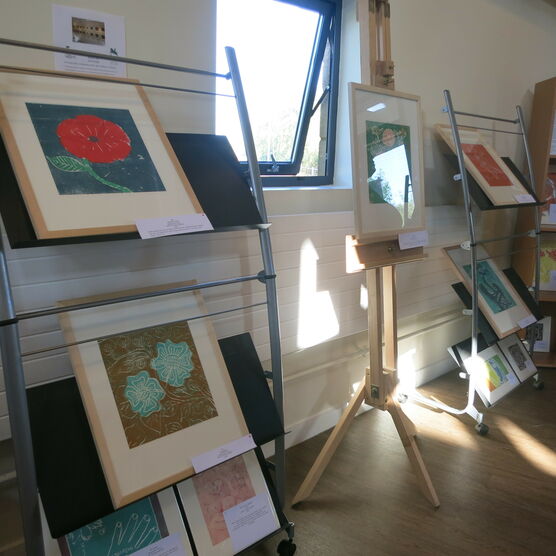 Framed prints on display at Bronzefield community cafe