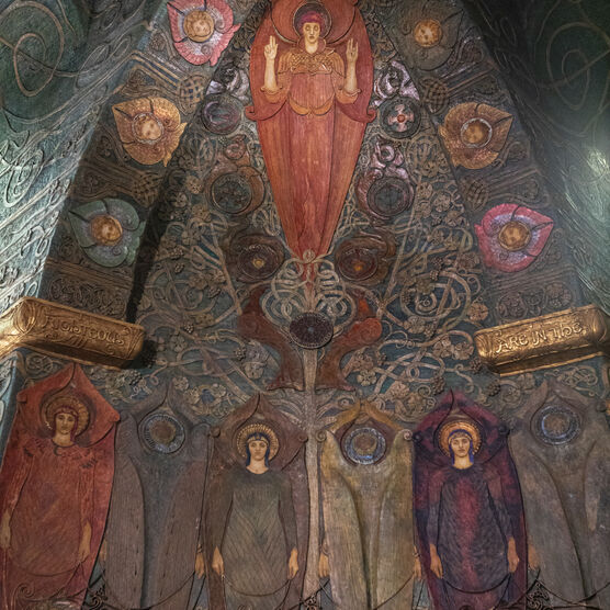 Interior of the chapel. The walls are mainly navy with intricate designs in bronze, gold and red among others colours.