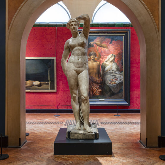 Nude figure statue in gallery