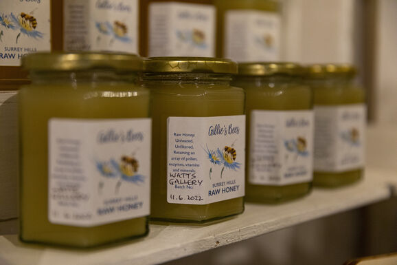 Jars of honey in a row