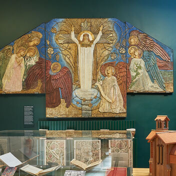 Decorative panel hung on wall in gallery