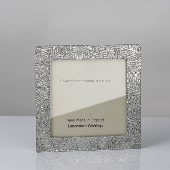 Intricately detailed square photo frame handmade from pewter