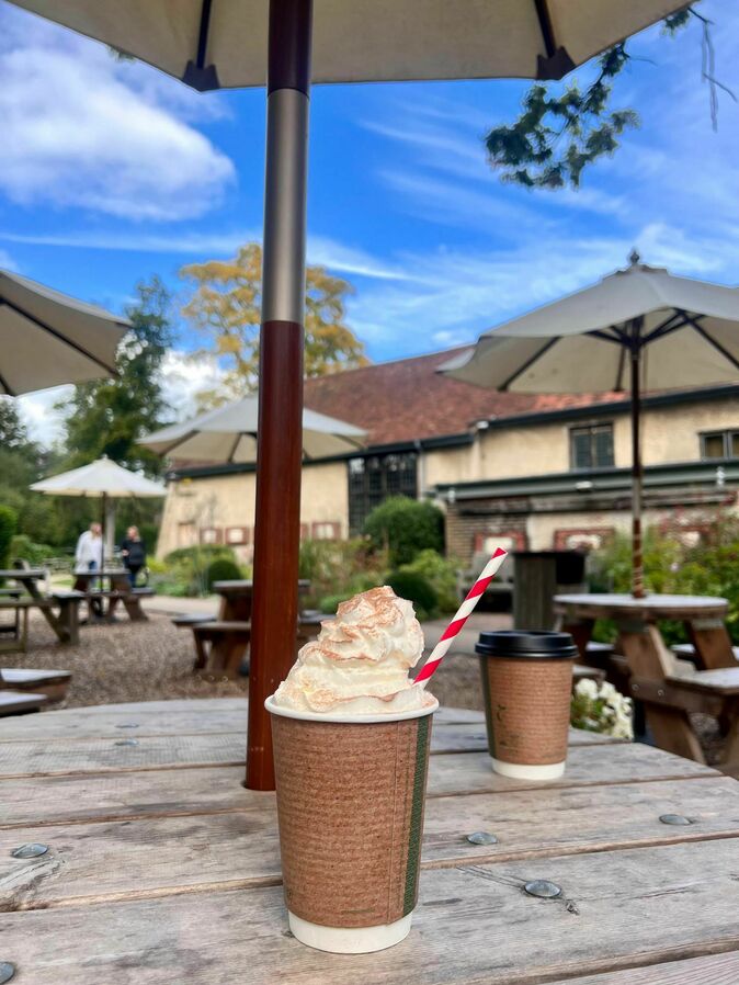 Two hot chocolate in takeaway cups