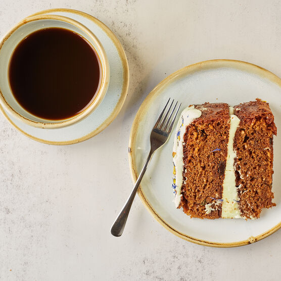 A slice of cake and a cup of coffee