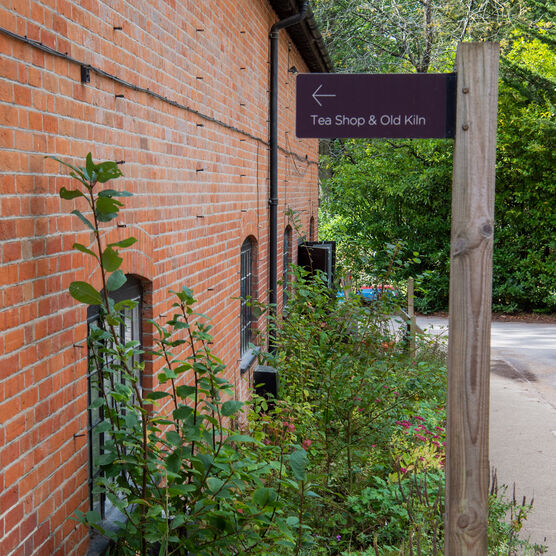 Outside the Tea Shop sign reads "Tea Shop and Old Kiln"