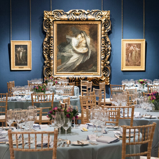 Round tables laid in gallery